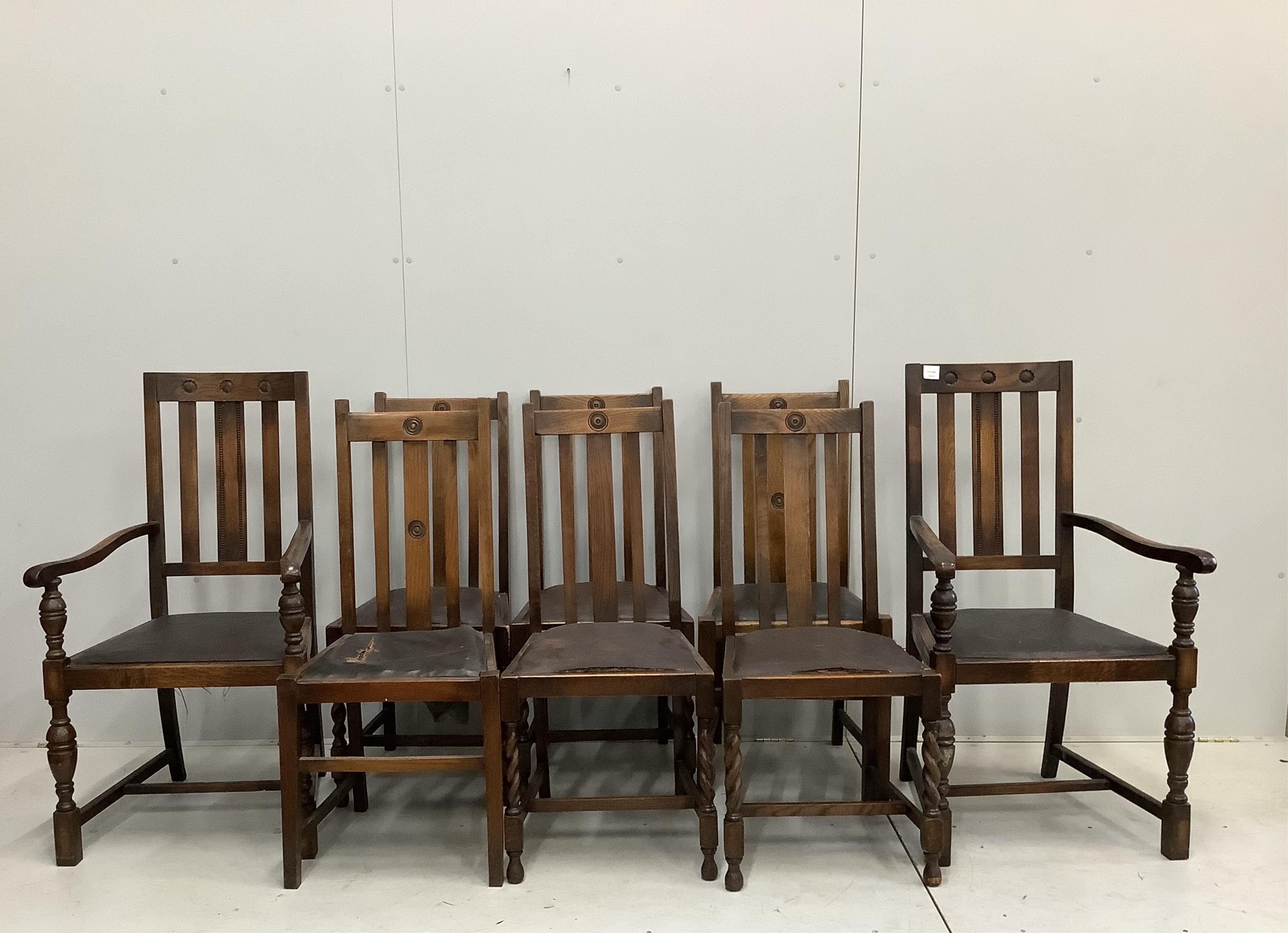 Eight 1920's oak dining chairs, two with arms